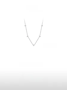 Detailed close-up of a silver S925 necklace featuring five delicate star-shaped pendants