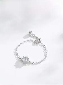 Detailed shot of S925 sterling silver chain ring with adjustable six-prong cubic zirconia