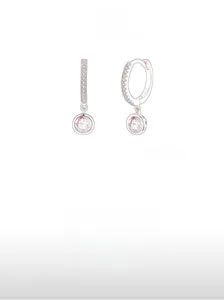 Detail view of S925 sterling silver hoop earrings with round purple zircon pendants