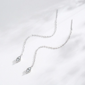 S925 sterling silver drop threader earrings with cubic zirconia tassels on white background