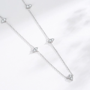 Elegant S925 silver necklace with sparkling heart-shaped zircons on white background