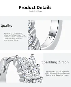 Détail d'une boucle d'oreille feuille en argent S925 avec zircons marquise et poinçon S925