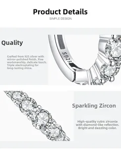 Macro detail of S925 sterling silver stamp and polished cubic zirconia earring setting