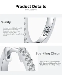 Detail view of S925 sterling silver hoop earrings with cubic zirconia and S925 hallmark