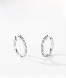 Macro view of S925 sterling silver hoop earrings with micro-set cubic zirconia stones