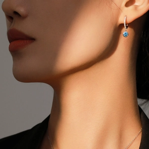 Elegant S925 silver jewelry set featuring blue gemstone hoop earrings with micro-pavé diamonds