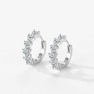 S925 sterling silver hoop earrings with five sparkling heart-shaped cubic zirconia stones