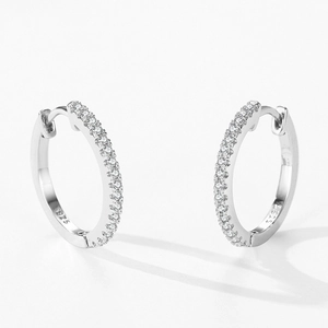 S925 sterling silver hoop earrings with micro-pave white zircon stones on white background