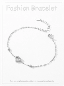 Close-up of S925 sterling silver heart bracelet with micro-pave cubic zirconia crystals