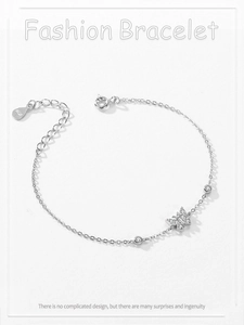 Detail of S925 sterling silver butterfly bracelet with micro-pave cubic zirconia stones