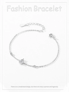Detail of S925 sterling silver chain with micro-pave heart pendant and lobster clasp