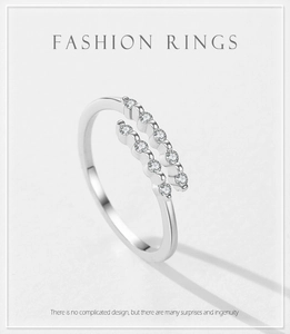 Detail of S925 sterling silver open ring featuring double row micro-paved cubic zirconia