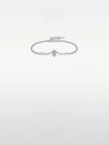 Macro shot of S925 silver bracelet featuring a pear-cut stone and adjustable chain link
