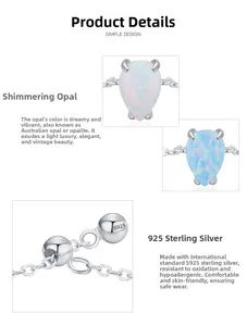 Detailed view of teardrop opal charm on S925 sterling silver chain with hallmark