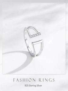 Macro view of S925 sterling silver geometric open ring with five pavé-set zircons