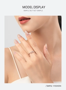 Detail of S925 sterling silver double-layered open ring with micro-pave zircons on finger