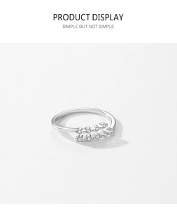 Detail of S925 sterling silver open ring with double-layered pavé set cubic zirconia