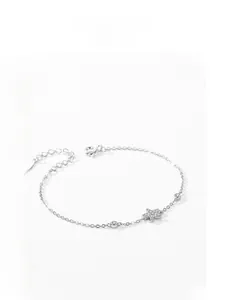 Macro shot of S925 sterling silver star bracelet featuring pave-set cubic zirconia stones