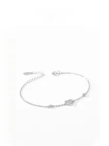 Close-up of S925 sterling silver heart bracelet featuring micro-pave cubic zirconia stones