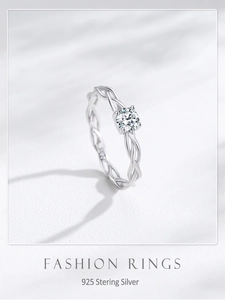 Close-up of S925 sterling silver twist band ring with round brilliant cut cubic zirconia
