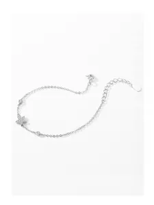 Macro detail of S925 sterling silver star bracelet with micro-pave cubic zirconia stones