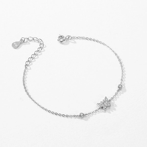 Elegant S925 sterling silver butterfly bracelet with sparkling zircon pave on white background