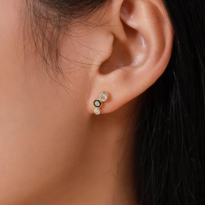 Orecchini a perno in argento S925 dorato con smalto nero e micro cristalli incastonati
