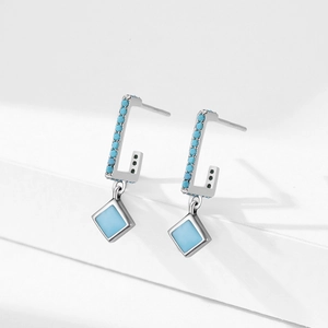 Elegant S925 sterling silver drop earrings featuring turquoise stones on a white background