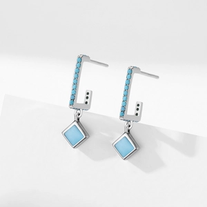 Elegant S925 sterling silver geometric earrings with turquoise blue stones on white background