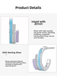 Detailed macro view of S925 silver rainbow enamel earrings with micro-inlaid cubic zirconia
