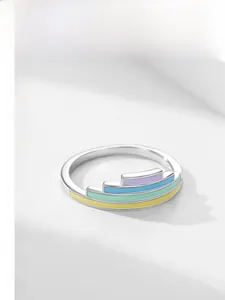 Close-up of S925 sterling silver ring with colorful rainbow enamel geometric steps