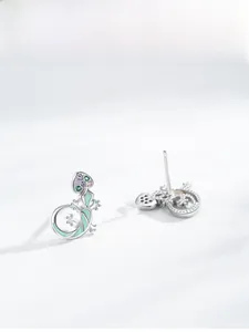 Detailed view of S925 sterling silver lizard earrings with colorful zircon and green enamel