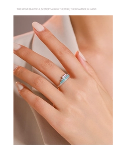 Close-up of S925 sterling silver ring with colorful enamel inlay and sparkling cubic zirconia
