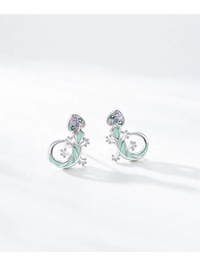 Macro detail of S925 silver lizard earrings with green enamel and colored zircons