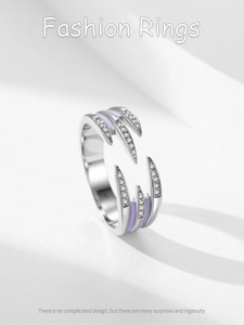 Detailed macro of S925 silver ring featuring purple enamel accents and white zircon stones