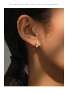 Detail view of S925 silver chain hoop earrings with green enamel and zircon stones