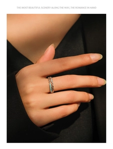 Detail of S925 silver double-layered chain ring with blue enamel and micro diamonds