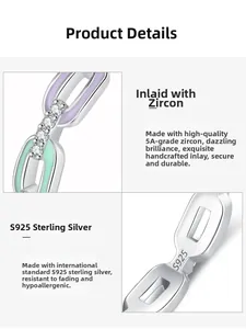 Detailed macro view of S925 sterling silver chain ring with colorful enamel and 5A zircon