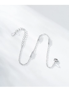 Vue détaillée d'un bracelet en argent sterling S925 avec zircons et poinçon d'authenticité