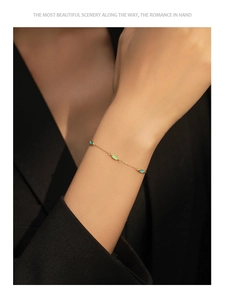 Detailed view of S925 sterling silver bracelet with colorful gradient enamel leaves on skin