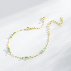 Elegant gold S925 silver bracelet with pastel blue and mint green enamel charms