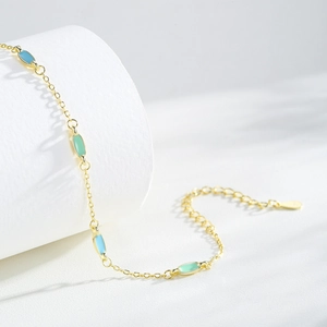 Elegant gold S925 silver chain bracelet with blue and mint green enamel oval charms