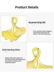Close-up of S925 sterling silver ginkgo leaf earrings with 14K gold plating and enamel
