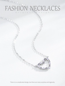 Detailed close-up of S925 silver heart necklace with purple enamel and zircon stones