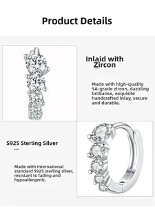Macro detail of S925 sterling silver huggie earrings with brilliant 5A zircon inlay