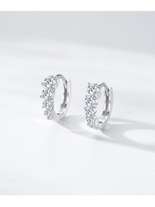 Macro view of S925 sterling silver hoop earring with gradient round-cut zircons