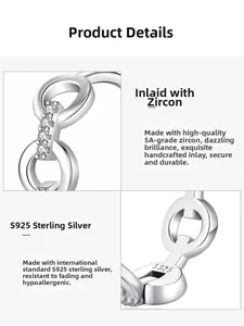 Close-up of S925 sterling silver stamp and hand-set 5A cubic zirconia on chain earrings