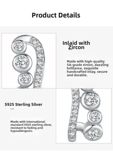 Detailed macro view of S925 sterling silver studs with hand-set 5A grade zircon stones
