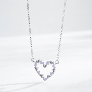 Elegant S925 silver heart necklace featuring purple enamel and sparkling zircon pendant