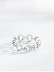 Macro view of interlocking S925 silver chain rings with micro-pave zircon settings